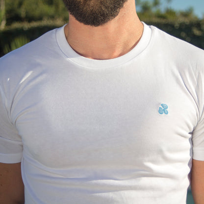 Close-up of the chest on an Out Now! t-shirt, highlighting the drops pattern placement. 