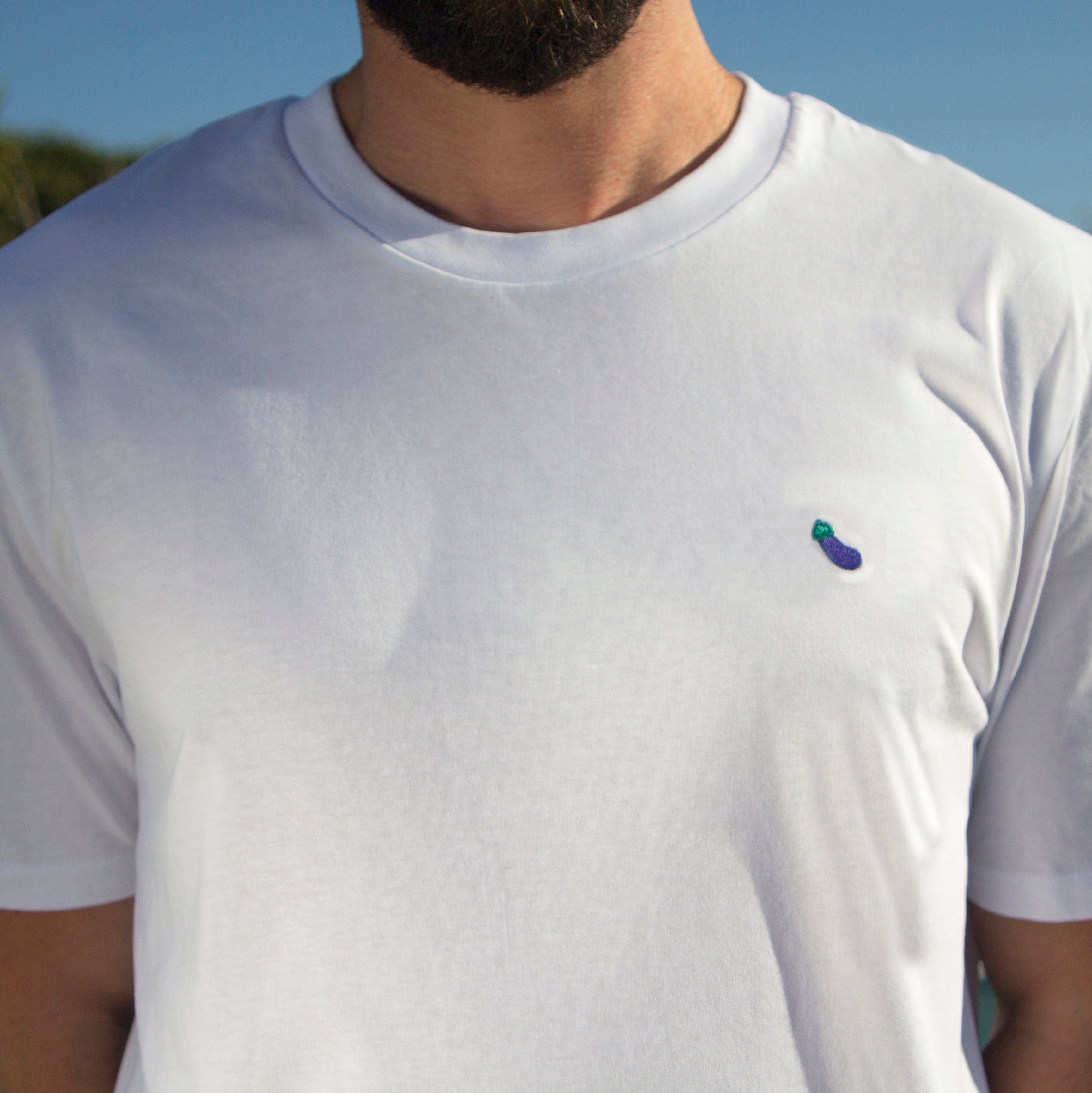 Close-up of the chest on an Out Now! t-shirt, highlighting the eggplant pattern placement.